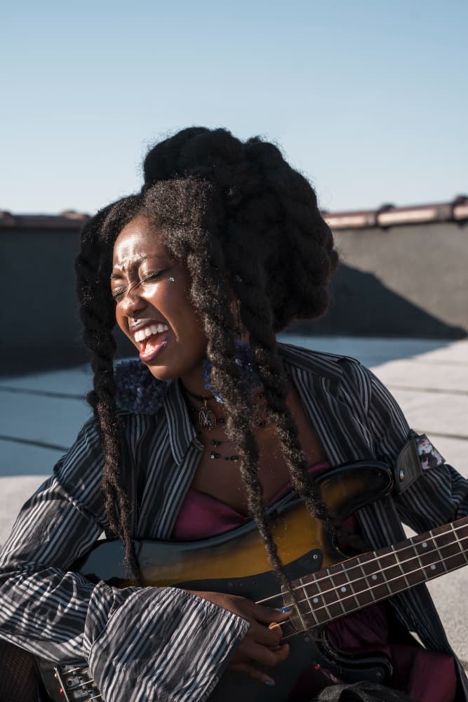 Woman playing guitar